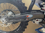 Load image into Gallery viewer, PRO CARBON KTM SWING ARM PROTECTOR 125 TO 450 SX / SX-F / XC / XC-F / SMR 2023-2024
