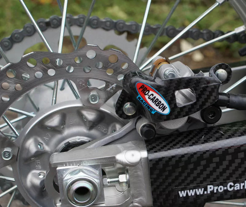 PRO CARBON HONDA REAR CALIPER PROTECTOR ALL CR/CRF 2002-2024